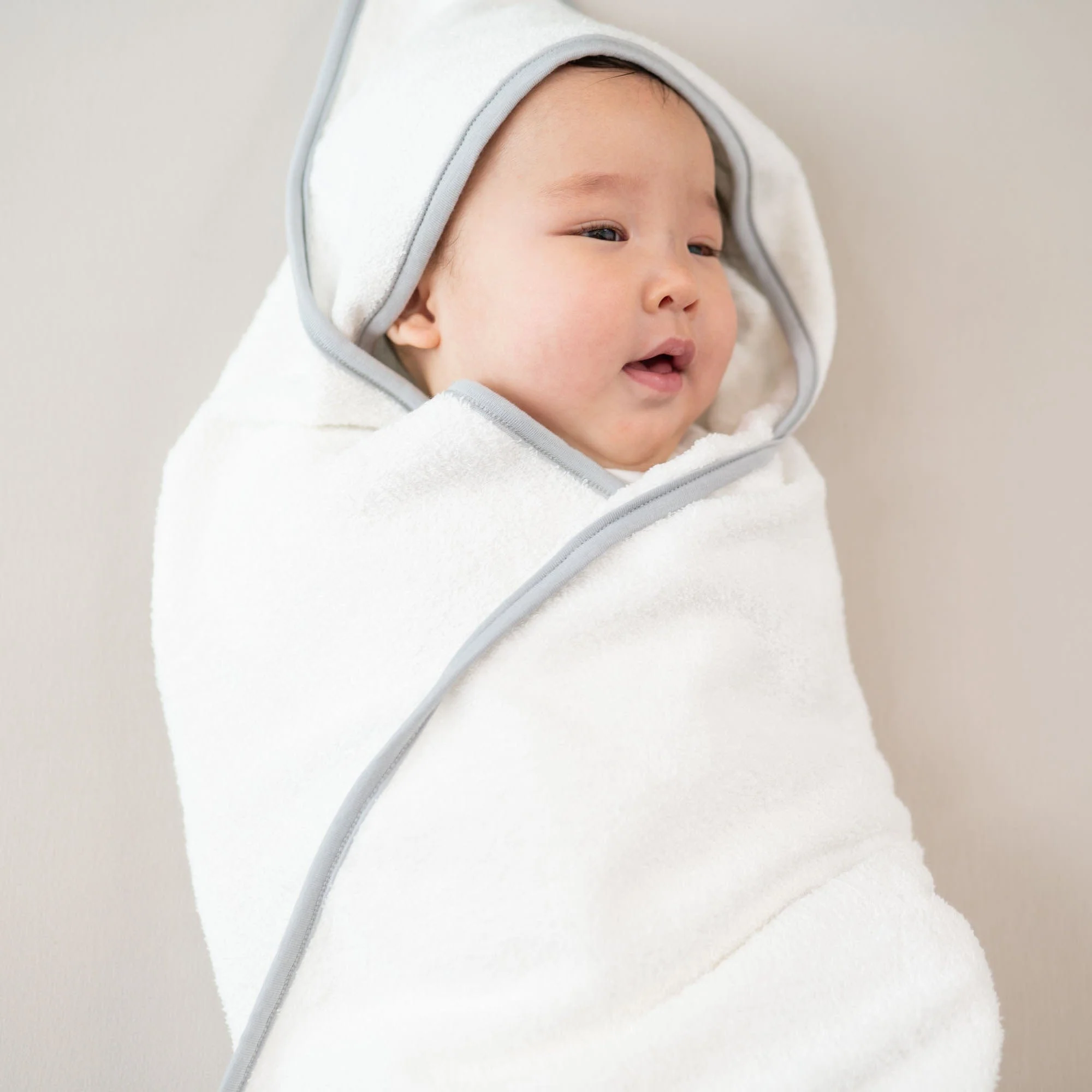 Hooded Bath Towel in Cloud with Storm Trim - Image 3