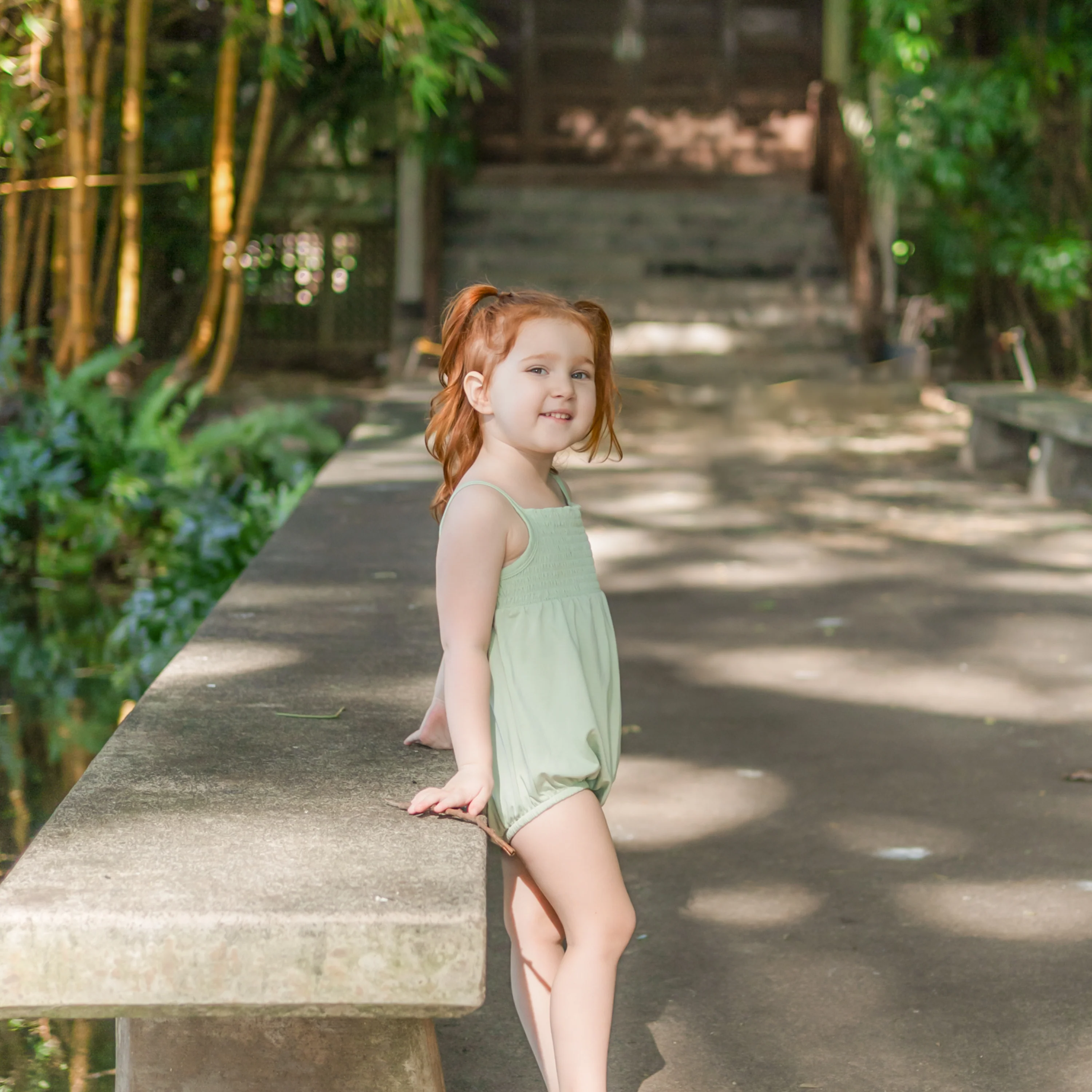 Smocked Bubble Romper in Basil - Image 3
