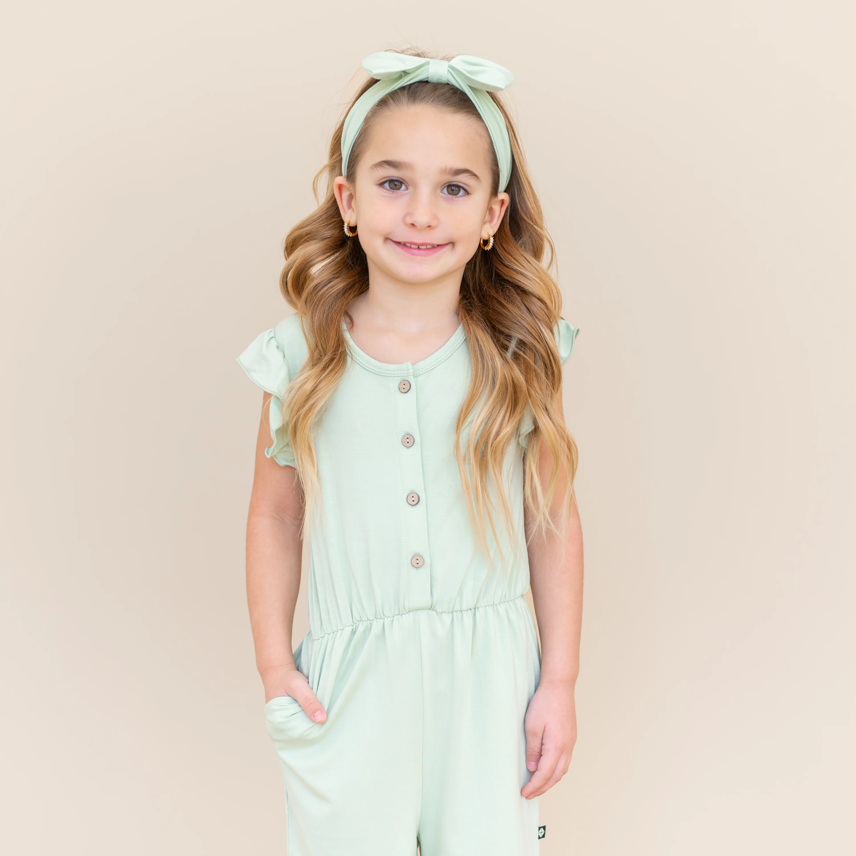 Flutter Sleeve Romper in Basil - Image 3