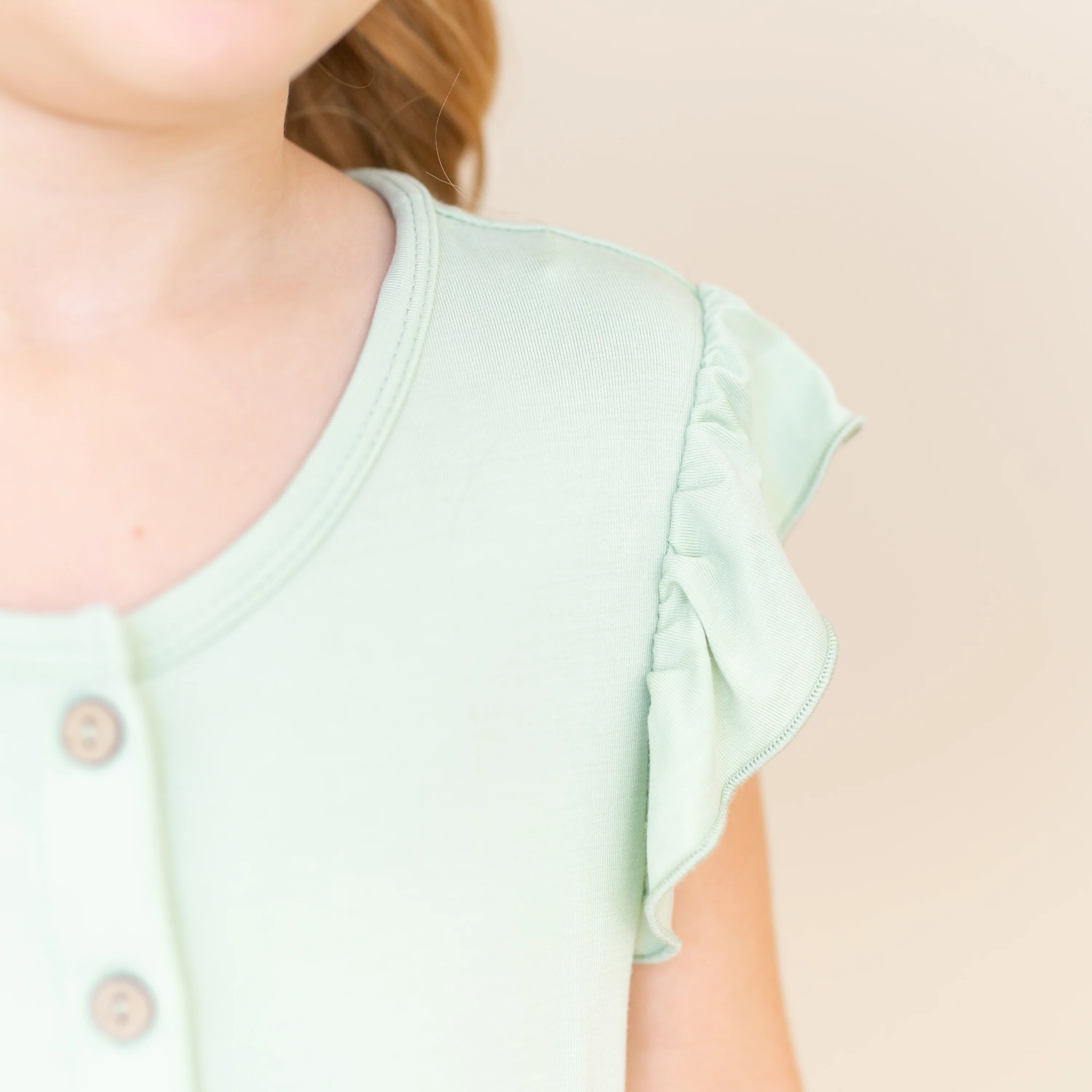Flutter Sleeve Romper in Basil - Image 4